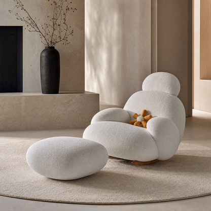 Fauteuil à bascule en tissu moelleux blanc dans un salon