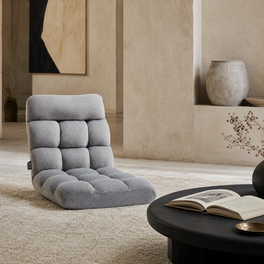 Fauteuil de sol pliable à dossier réglable sur un tapis