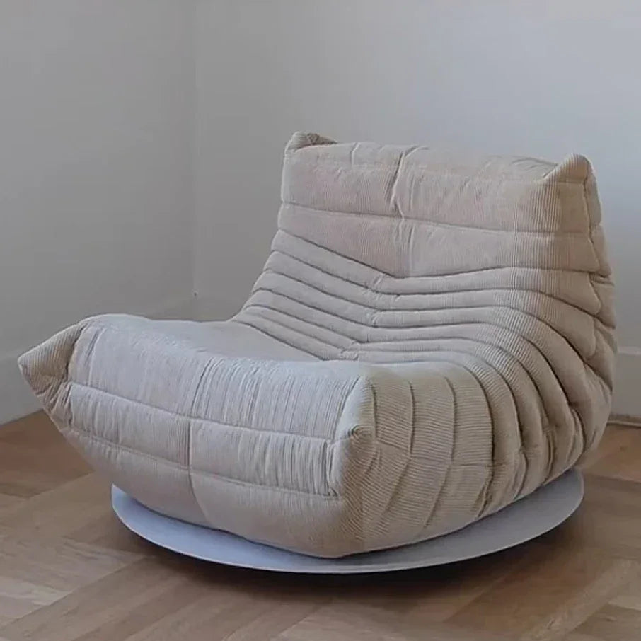 Chauffeuse basse en velours côtelé beige