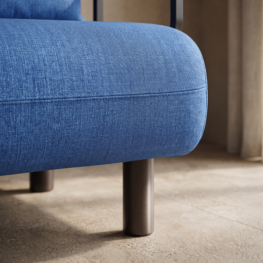 Gros plan sur le tissu coton-lin et le pied du fauteuil-lit convertible